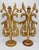 A stunning pair of tall gold gilded wooden candlestick holders, made in Italy, circa 1920s. Lovely, ornate carvings of...