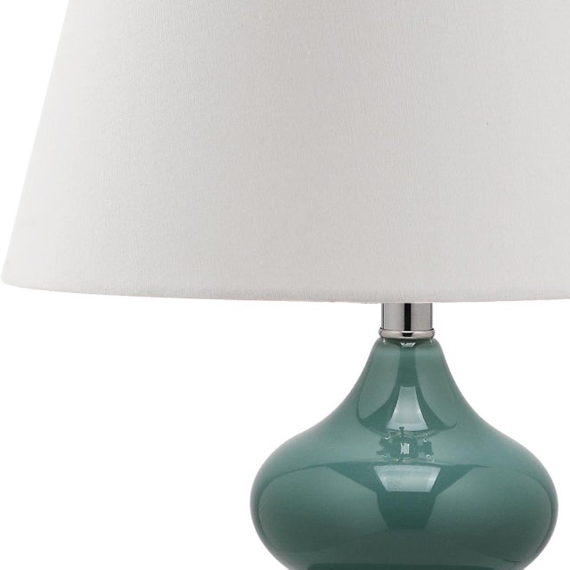 Illuminate your living room, bedroom or family room in style with the shimmery blue Double Gourd Glass Lamp with...