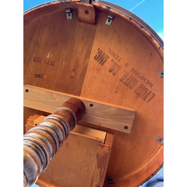 A charming pedestal drum table with real provenance — stamped on the underside with the original maker's mark from Lyon...