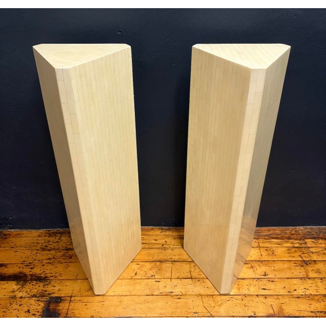 Uniquely designed triangular pedestal or column stand in the style of Karl Springer. Featuring herringbone style...