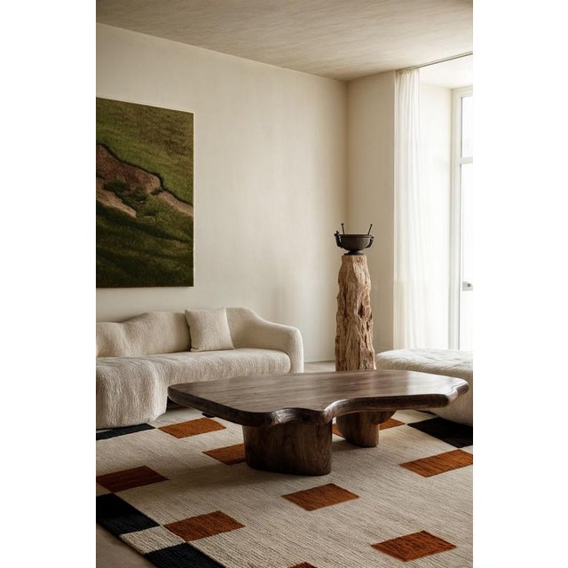 The Wood Rug embodies an opulent, earthy character that roots you in a world of rich cultures. Its intensely woody essence...