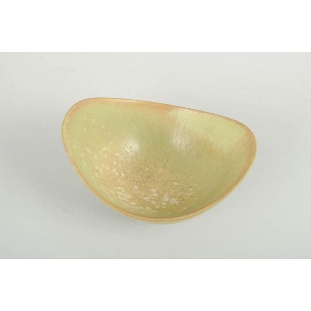 Gunnar Nylund for Rörstrand Bowl, mid-20th century. Elegant organically shaped stoneware bowl with the characteristic...