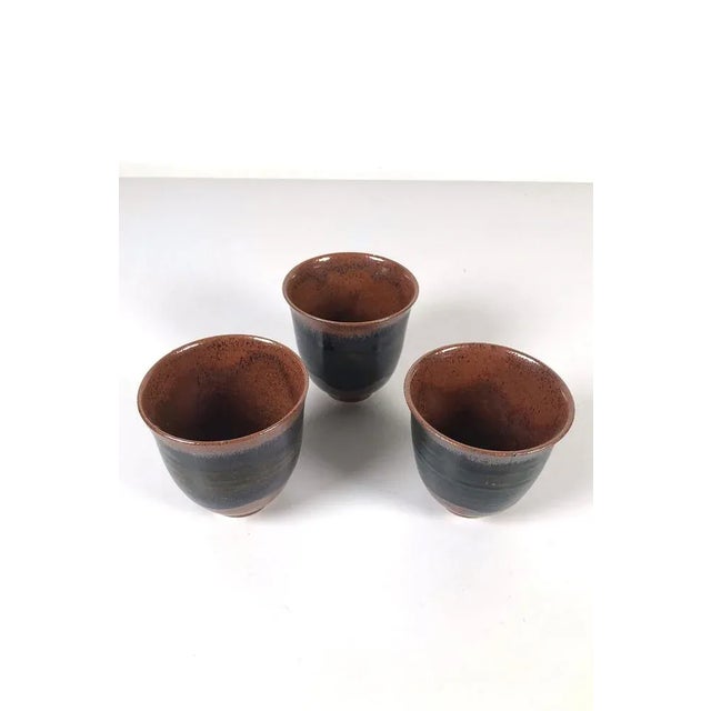 Set of three Ingeborg Zenker pots in earth tones. In one of the jars there is a hairline crack, see photos. Measurements...