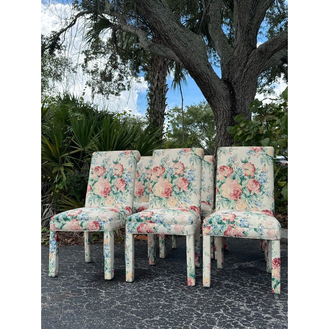 A fabulous set of six vintage Parsons dining chairs featuring beautifully shaped upholstered backs, generously cushioned...