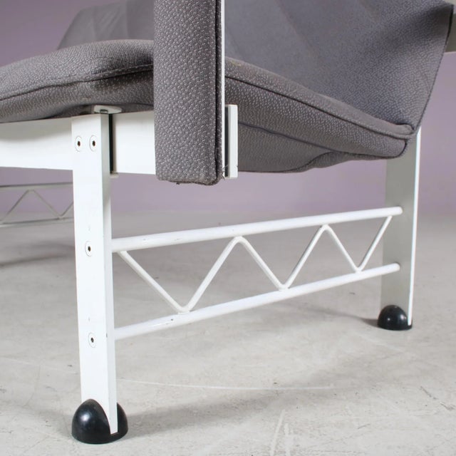 A unique 2-seater sofa manufactured in Germany around 1980. It has a white lacquered metal frame with beautiful...