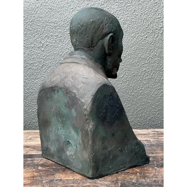 This evocative vintage Asian scholar bust captures a sense of timeless wisdom and quiet contemplation. Rendered with...