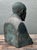 This evocative vintage Asian scholar bust captures a sense of timeless wisdom and quiet contemplation. Rendered with...