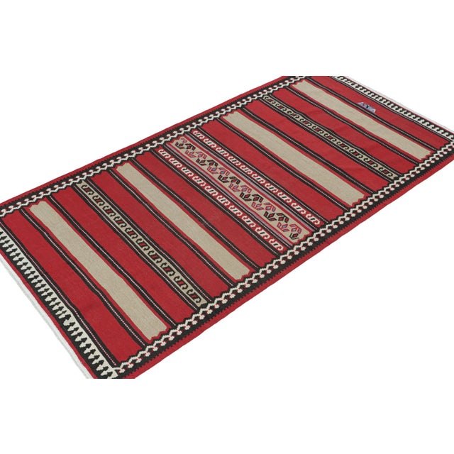 This vintage 5x10 Persian Kilim is believed to be a Shahsavan tribal rug. Handwoven in wool, it originates circa 1950-1960...