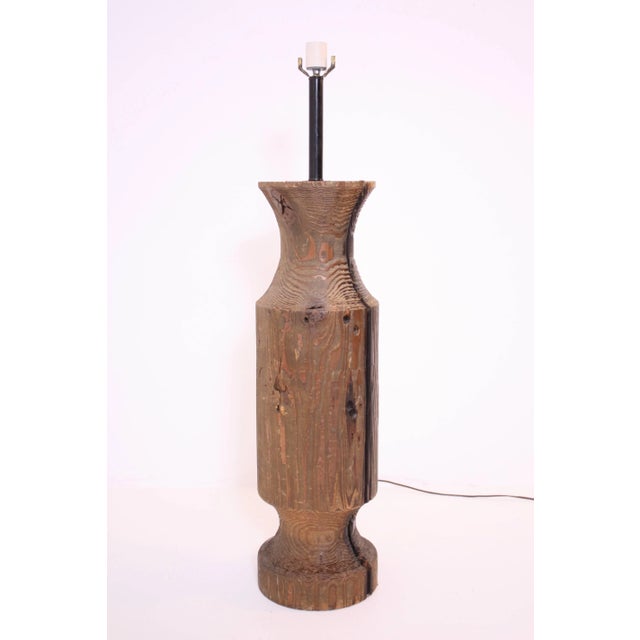 Large turned wood lamp with wonderful natural splits, knots and graining. Pictured with Kofod Larsen lounge chair and...