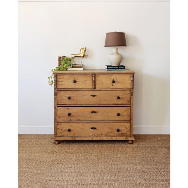 Width: 51 inches Height: 47 inches Depth: 25 inches Crafted from richly patinated solid pine, this substantial late 19th-...