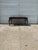 We have a beautiful vintage Spanish Colonial Revival coffee table for sale. It features deeply carved details, a pierced...