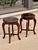This pair of Chinese stools have been restored by us with high gloss dark brown / red lacquer. The surface still shows a...