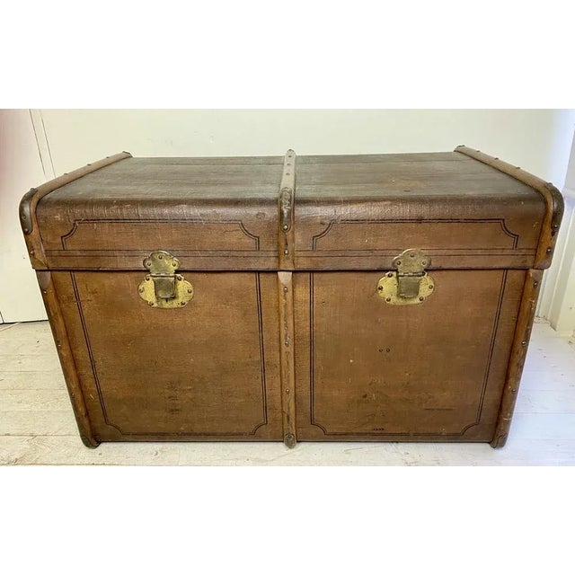 Large antique travel trunk from the early 20th century. It has many beautiful details and is also extremely suitable as a...
