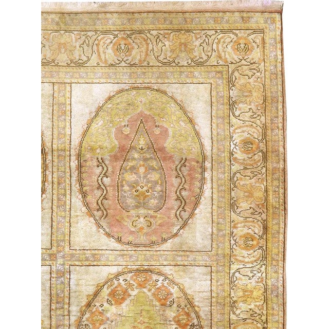 A vintage Turkish Sivas carpet from the second quarter of the 20th century. Measures: 4' 0" x 5' 11"