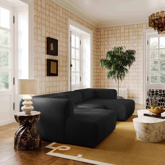 Introducing the Tarra Fluffy Oversized Corduroy Modular Sectional, a revolution in comfort and versatility. Sink into its...