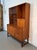 Showcase your items with timeless sophistication with this teak display cabinet by Turnidge of London, . A refined example...