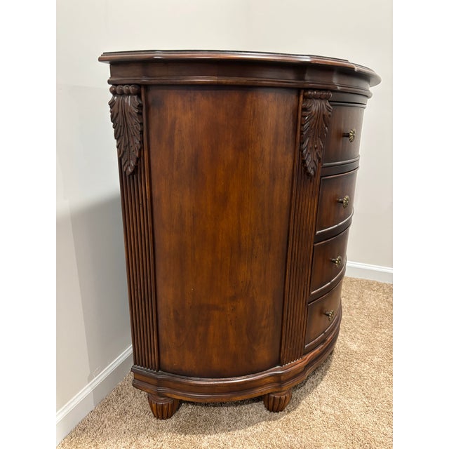 Beautiful traditional cherry stain demilune chest. Inlay on top. Brass pulls. Four drawers South Seas by Hooker