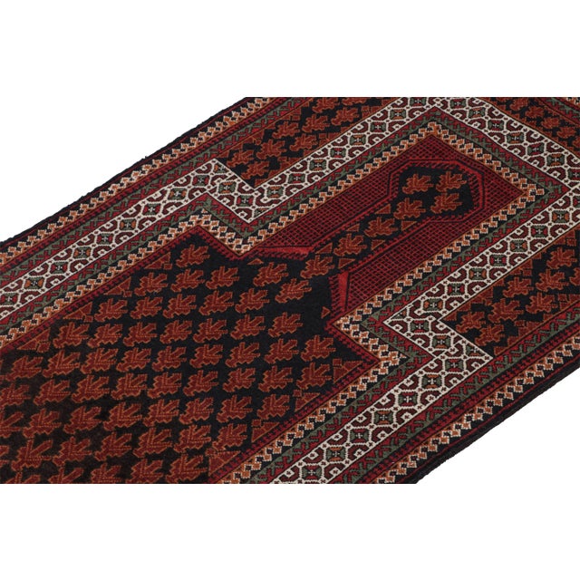 Hand knotted in wool, this 3x5 Baluch rug represents a new line of tribal carpets in the Modern Classics Collection by Rug...