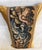 This decorative pillow is upholstered with an authentic 18th-century tapestry, showcasing a beautifully detailed bird...