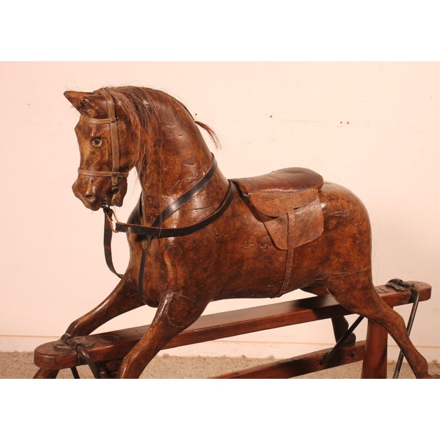 Superb 19th-century polychrome wooden rocking horse A superb example, probably the finest we have seen, with a beautiful...