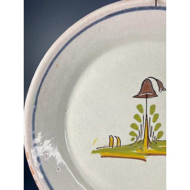 French Faience Plate with Central Hunting Hat on Branch from Nevers, Late 18th Century For Sale - Image 5 of 8