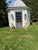 A charming pair of vintage garden planters cast in a composite material resembling cast stone or cement, each formed as a...