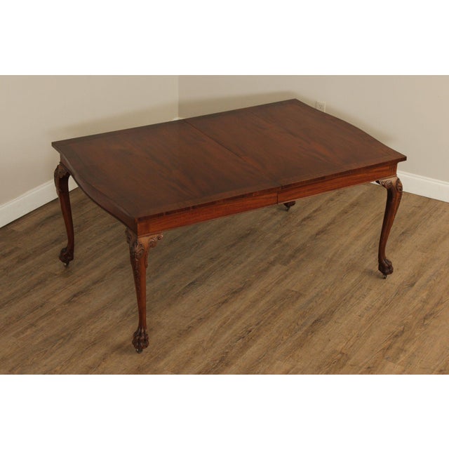 High Quality Vintage Mahogany Extendable Dining Table Mounted on Rolling Casters, with Shell Carved Legs and Paw Feet,...