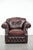 This delightful red-mottled cowhide Chesterfield armchair in English style not only offers a beautiful look in your chosen...