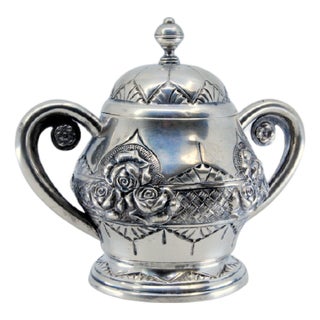 Silver Sugar Bowl with Floral Reliefs, Double Handle and Resting on a Grooved Base For Sale