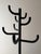 The silhouette immediately reveals what this design is all about. A simple construction of black lacquered metal is...