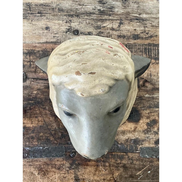 This vintage painted ram bust is a captivating example of mid-century folk art, skillfully rendered in plaster with a...