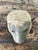 This vintage painted ram bust is a captivating example of mid-century folk art, skillfully rendered in plaster with a...