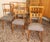 Set of 6 chairs with a maple frame and light gray leather upholstery. The frame is in the typical style of the late period...