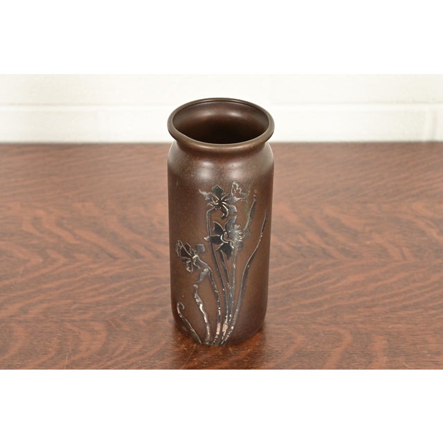 A beautiful Arts & Crafts period sterling silver on bronze cylinder vase with floral motif By Heintz Art Metal Shop USA,...