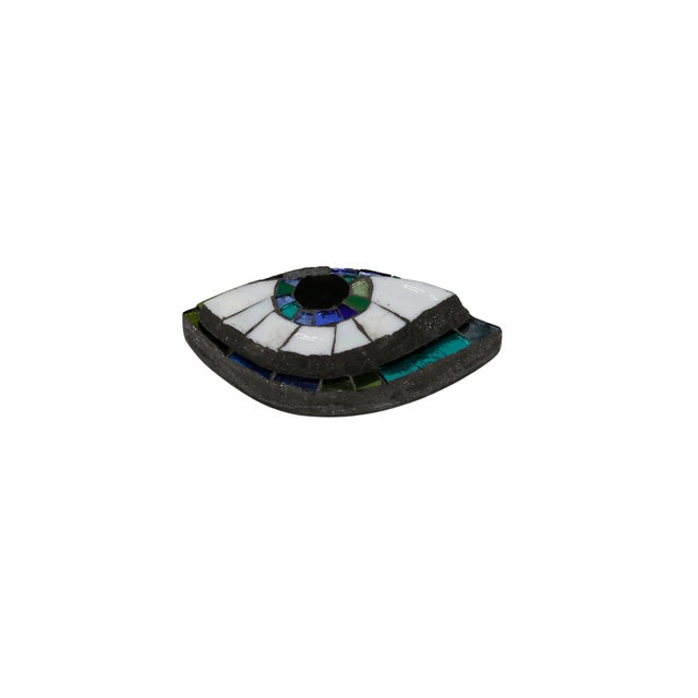 Glass and mirror mosaic eye wall sculpture by Mallorca-based, German-born mosaics-focused artist, Ruth Minola Scheibler....