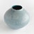 With a simple shape, reactive glaze and highly textured organic dot pattern, this decorative vase is a true work of art. A...