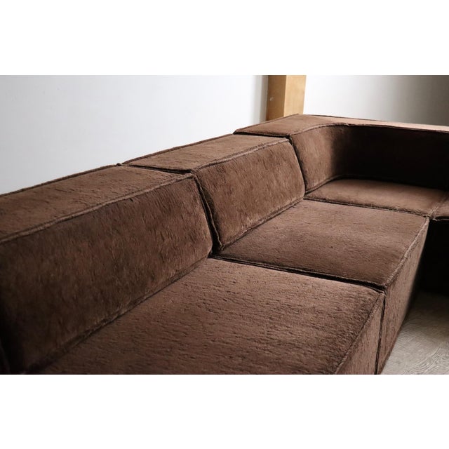 The iconic modular sofa cor trio, executed in a stunning original brown teddy fabric. The design was created in 1972 by...
