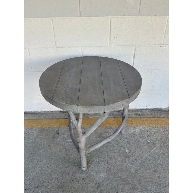 Stylish Made Goods Co Duke Stonecast Side Table. Sculptural Branch style legs, gray tones. Faux Bois Stonecast Composite....