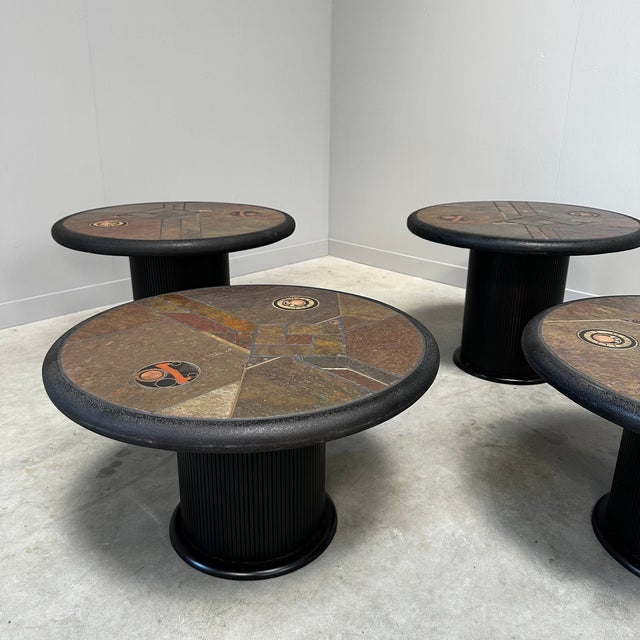Set of 4 Paul Kingma (1931-2013) round coffee tables made of stone and slate with inlaid coins and brass and copper...