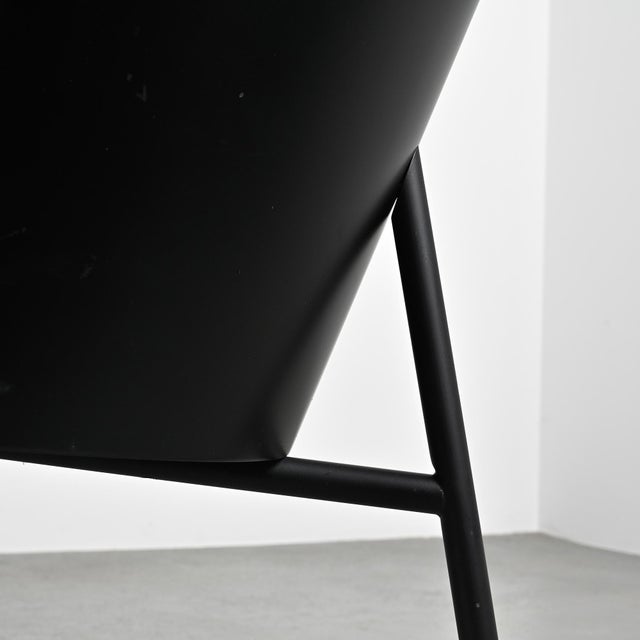 Pair of "Costes" armchairs designed by Philippe Starck for Aleph Driade, Italy, circa 1984. Black lacquered tubular steel...