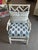 This simple, chic bamboo chair has been painted white and outfitted with a gorgeous cushion and lumbar pillow. The cushion...