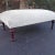 Late 20th Century Traditional Style Ottoman With Turned Legs Newly Upholstered in Pollack For Sale - Image 4 of 8