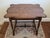 Beautiful solid wood table styled after a 17th century William and Mary English Oak table with scalloped-edge top and a...
