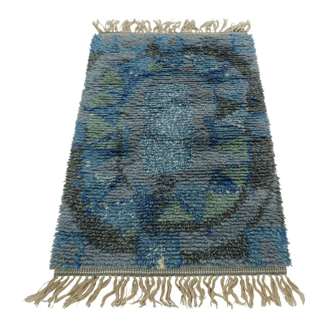 Hand-knotted in lush, high-pile wool in Sweden circa 1960-1970, this 3x4 vintage Swedish Rya rug is a bold new addition to...