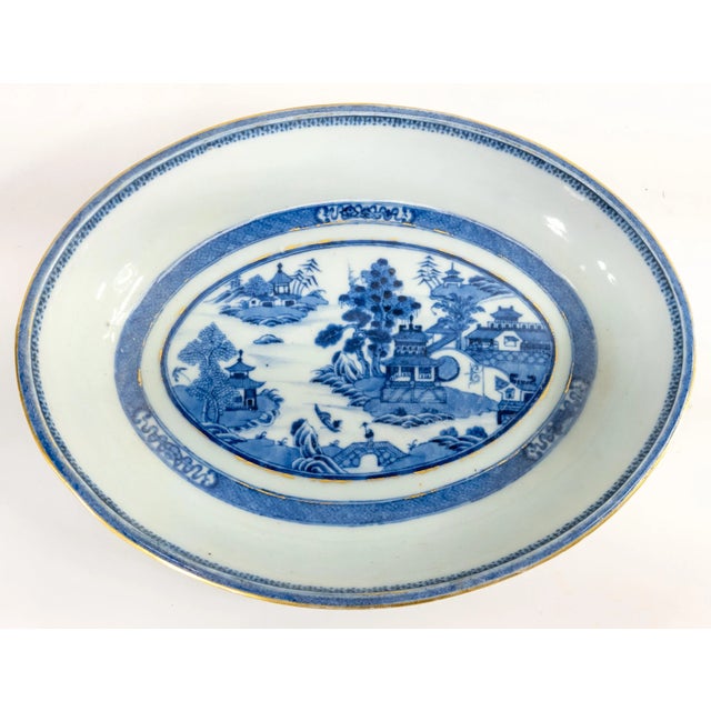 We are selling this nice Chinese Export Nanking Canton vegetable bowl or dish with landscape and traces of gilding, we...