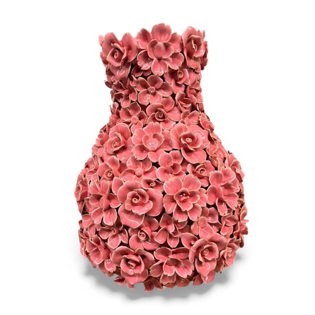 A spectacular and highly detailed indigo pink glazed ceramic vase, completely covered in three-dimensional, hand-applied...