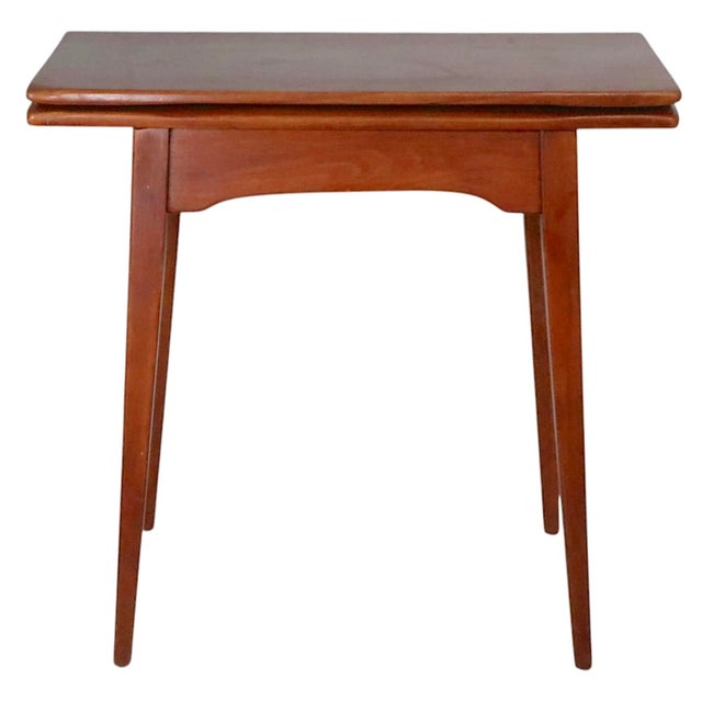 Flip top console game table made in Vermont by Cushman as part of the classic Colonial Collection series. This example is...