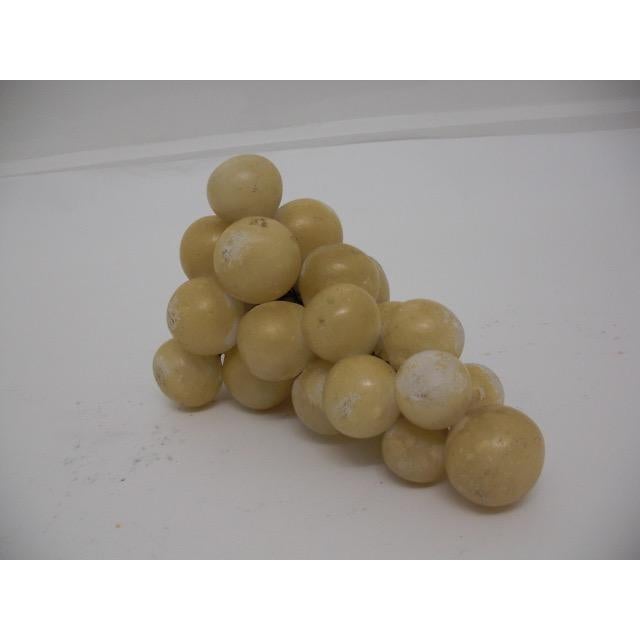 Vintage Italian alabaster stone grapes cluster with a cream-colored base with a slight yellow undertone.