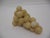 Vintage Italian alabaster stone grapes cluster with a cream-colored base with a slight yellow undertone.