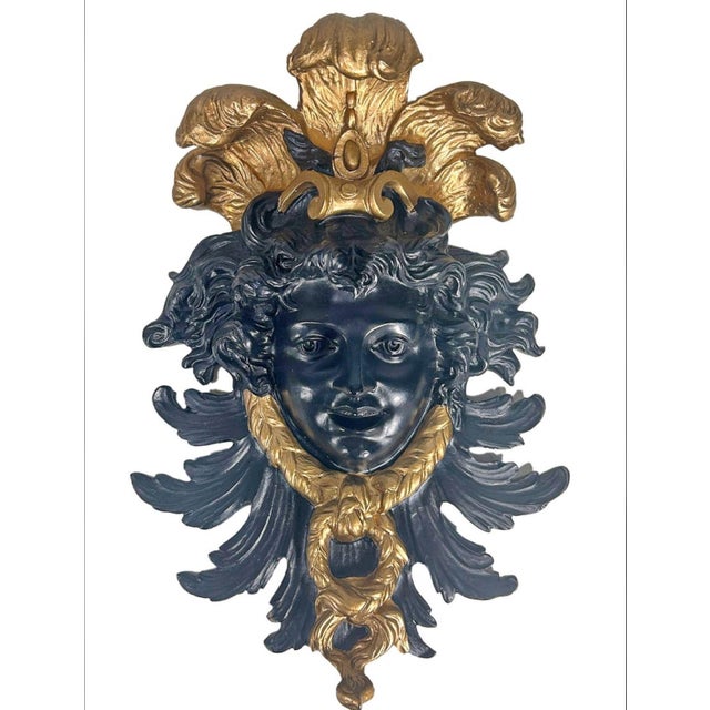 Pair of Black & Gold Composition Faces Plaques from France